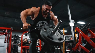 2023 Mr. Olympia champion Derek Lunsford performs t-bar rows at Bev's Powerhouse Gym.