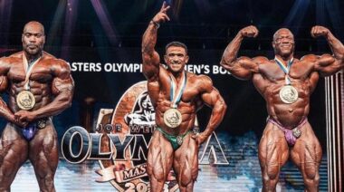 Bodybuilders flexing on stage