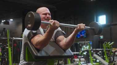 Mitchell Hooper performing preacher curls.