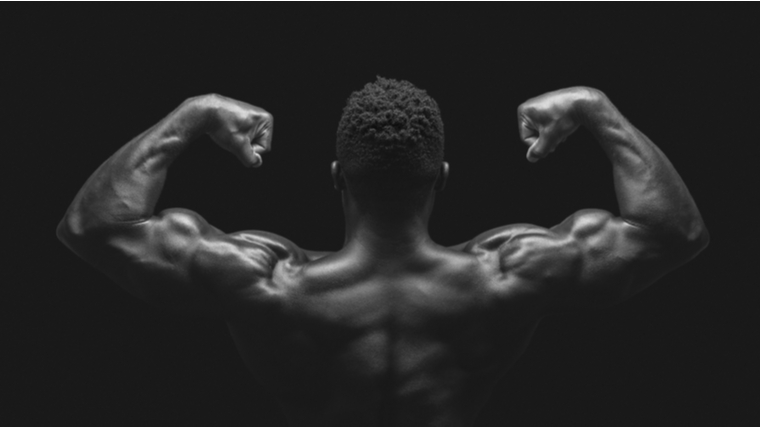 Bodybuilder flexing back, shoulders, and arms