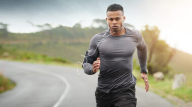 person running on road